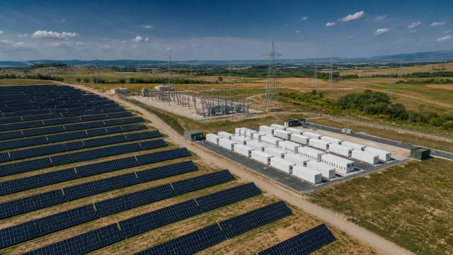 Illustrative solar farm with battery storage, a substation and transmission lines